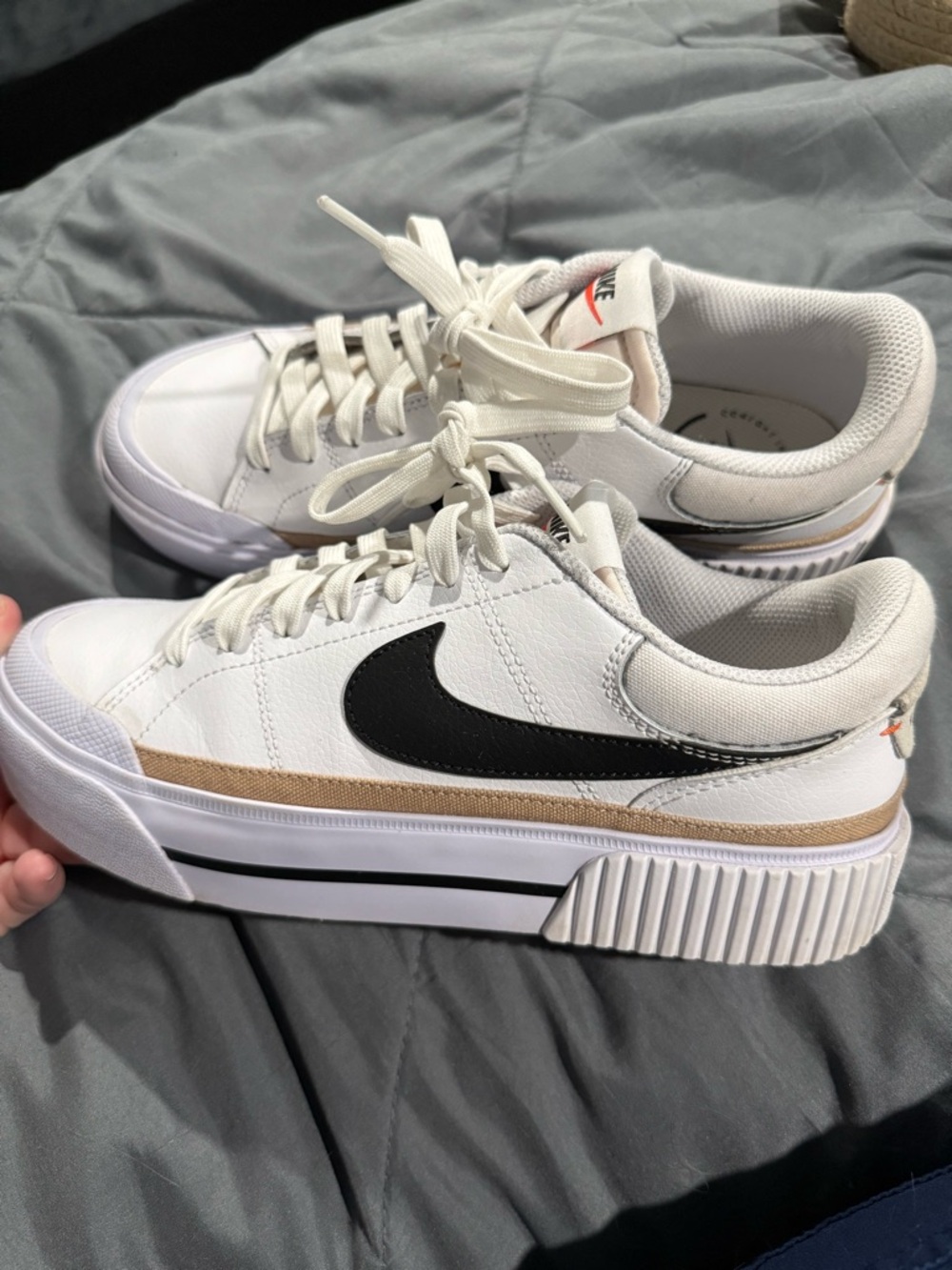 Nike Women's White Sneakers with Black Swoosh and Tan Trim